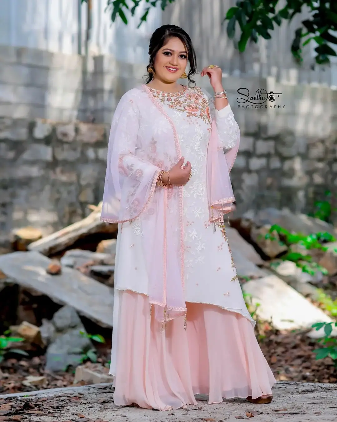 Meghana Raj Wearing Beautiful Earring White Designer Gown